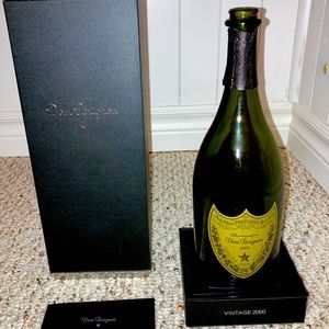 Don’t Perignon box and bottle, empty. Vintage 2000